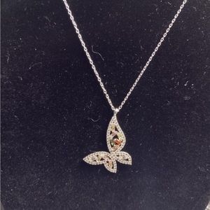 Awesome butterfly necklace. Sterling silver 9.25 chain is 18”colored rhinestones